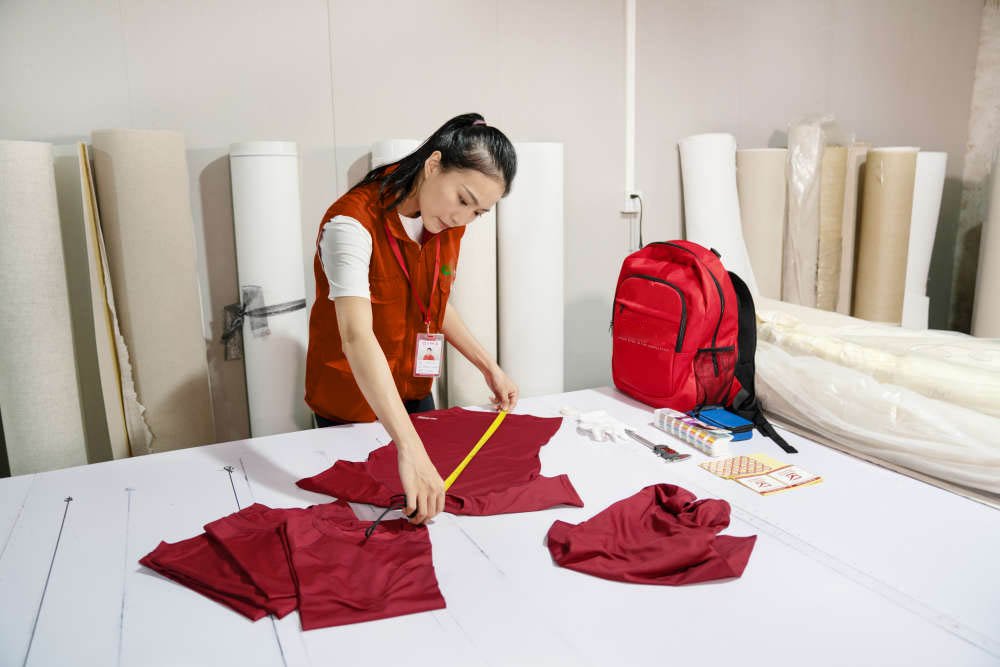 Jinfeng apparel inspector performing inspections on garments