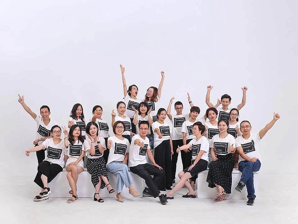 
A group photo of the team from the fashion brand company