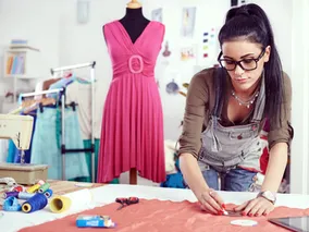 An image showing the different stages of the garment sampling process, from pattern development to quality control, highlighting the detailed steps involved.