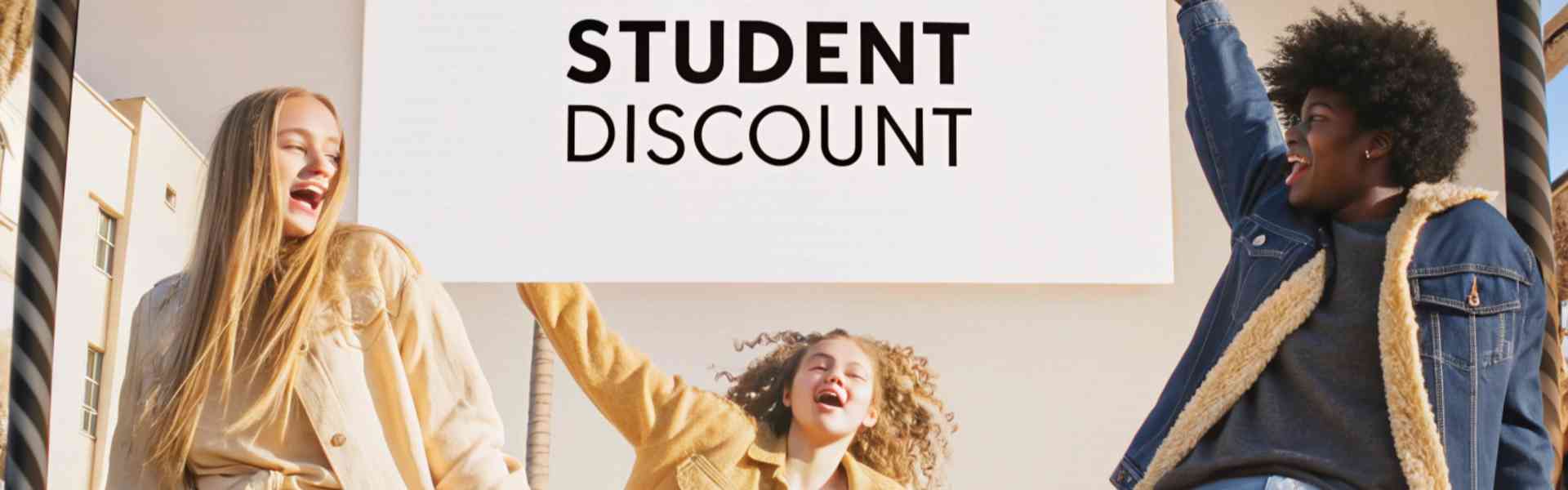 A billboard promoting a 20% ASOS student discount with happy students.