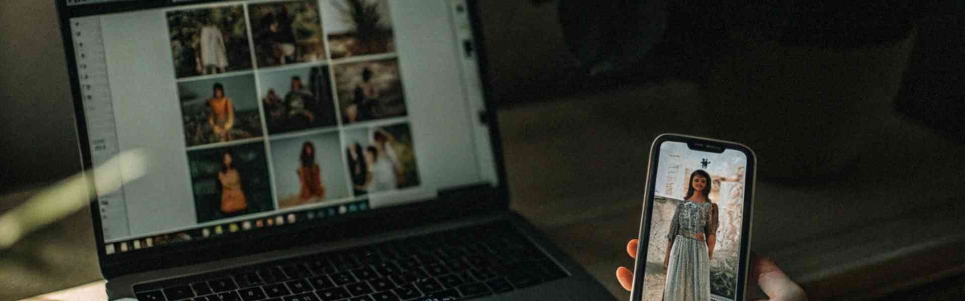 Laptop and smartphone displaying fashion images.