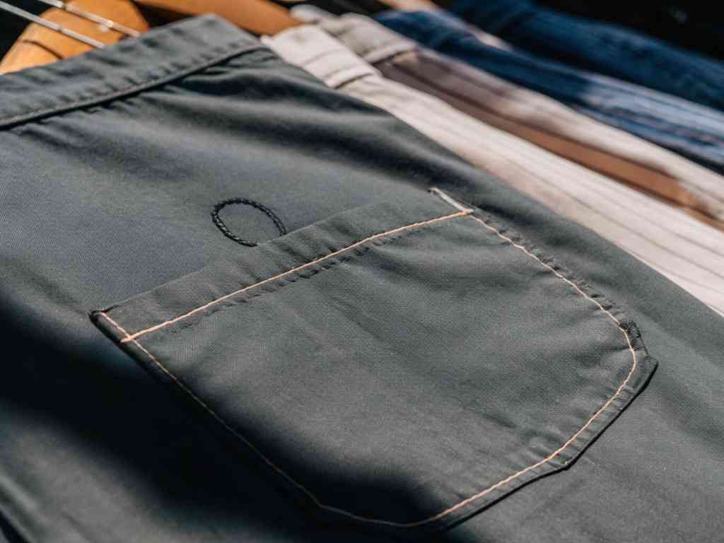 Close-up of pants pocket with contrast stitching