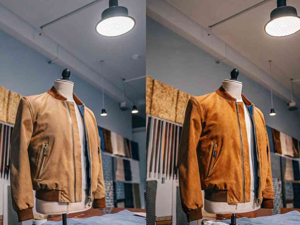 Two tan bomber jackets displayed on mannequins under studio lighting