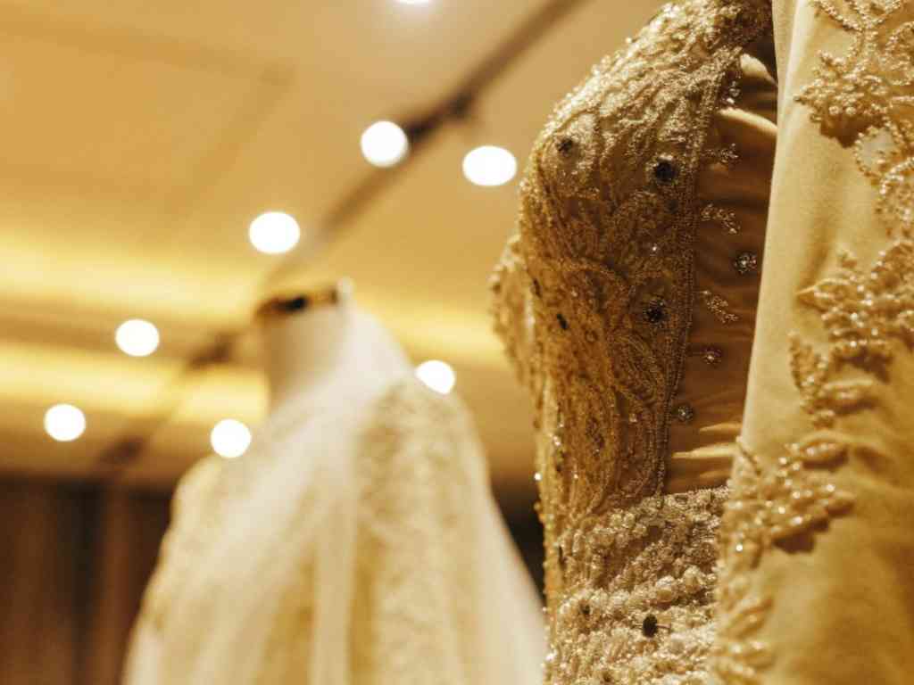 Close-up of detailed wedding dresses on mannequins